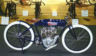[photo of blue
	1914 Cyclone Motorcycle]