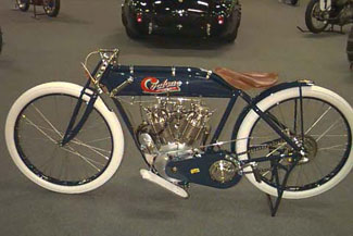 [photo of blue 
	1914 Cyclone Motorcycle]