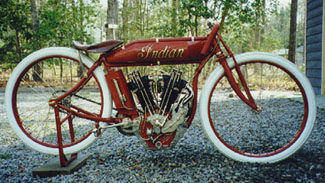 [photo of red
1915 Indian Motorcycle]